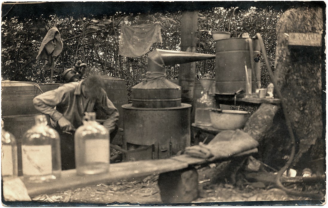 A moonshine still somewhere in Appalachia circa 1930.